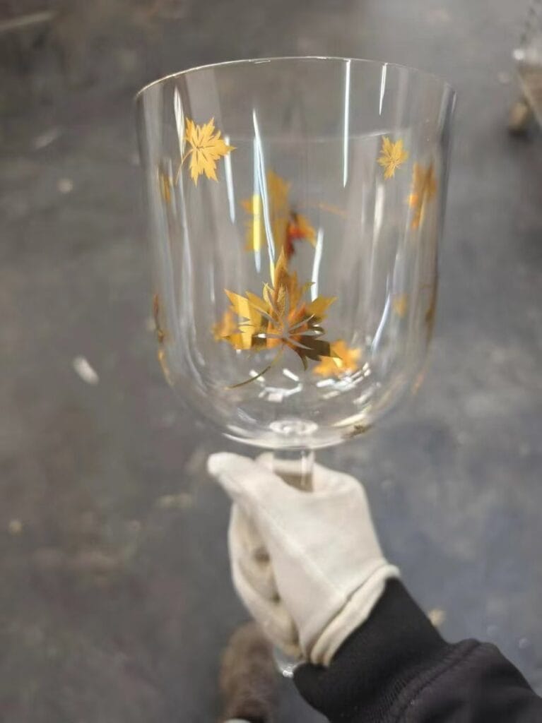 clear handheld crystal singing bowl (practitioner) with gold butterfly design