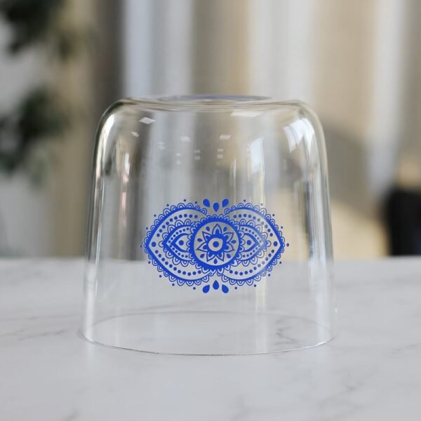 clear crystal singing bowl with third eye chakra design
