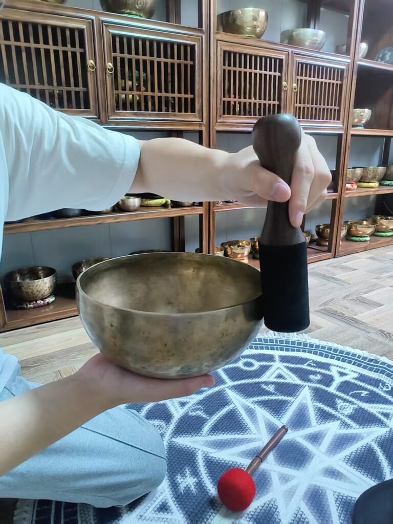 play singing bowl