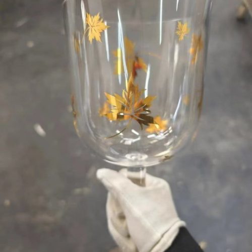 clear handheld crystal singing bowl (practitioner) with gold butterfly design